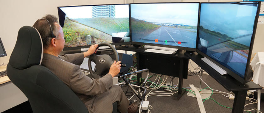 Man remote driving from a cockpit