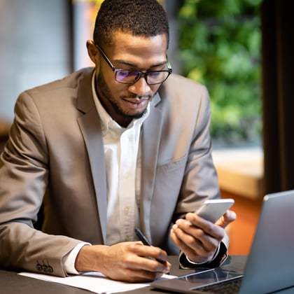 black-business-guy-taking-notes-in-notebook-holdin-2022-12-16-09-15-20-utc1 copy2-1