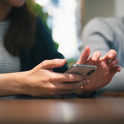 professional-business-person-holding-smartphone-an-2022-12-16-02-25-56-utc1 copy3