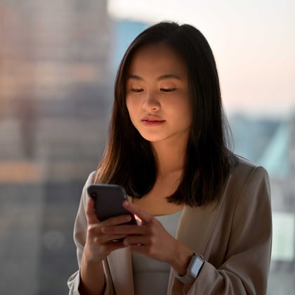 young-asian-professional-business-woman-using-phon-2023-05-03-07-00-43-utc1