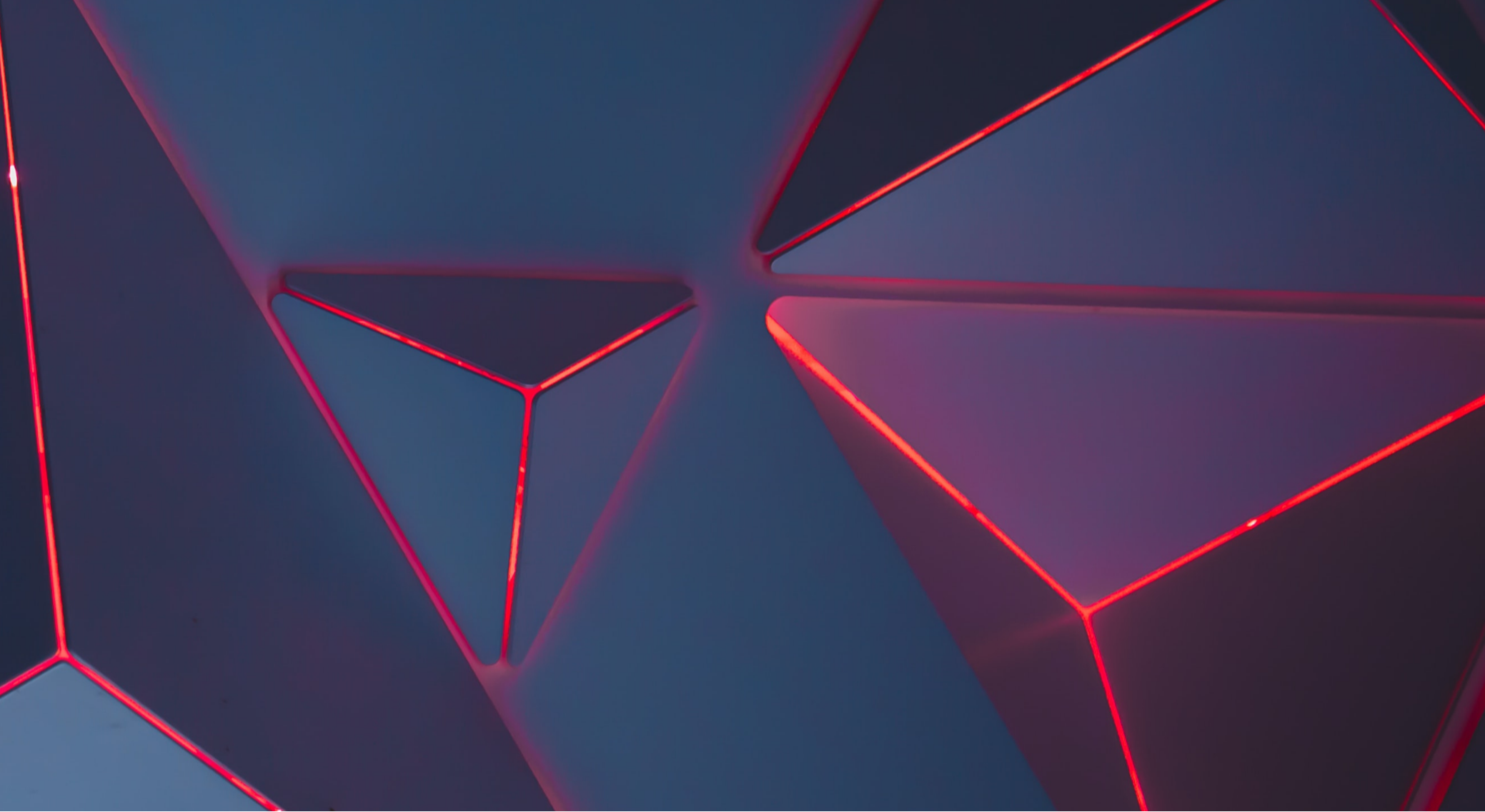 Triangular shapes in red and dark grey colours